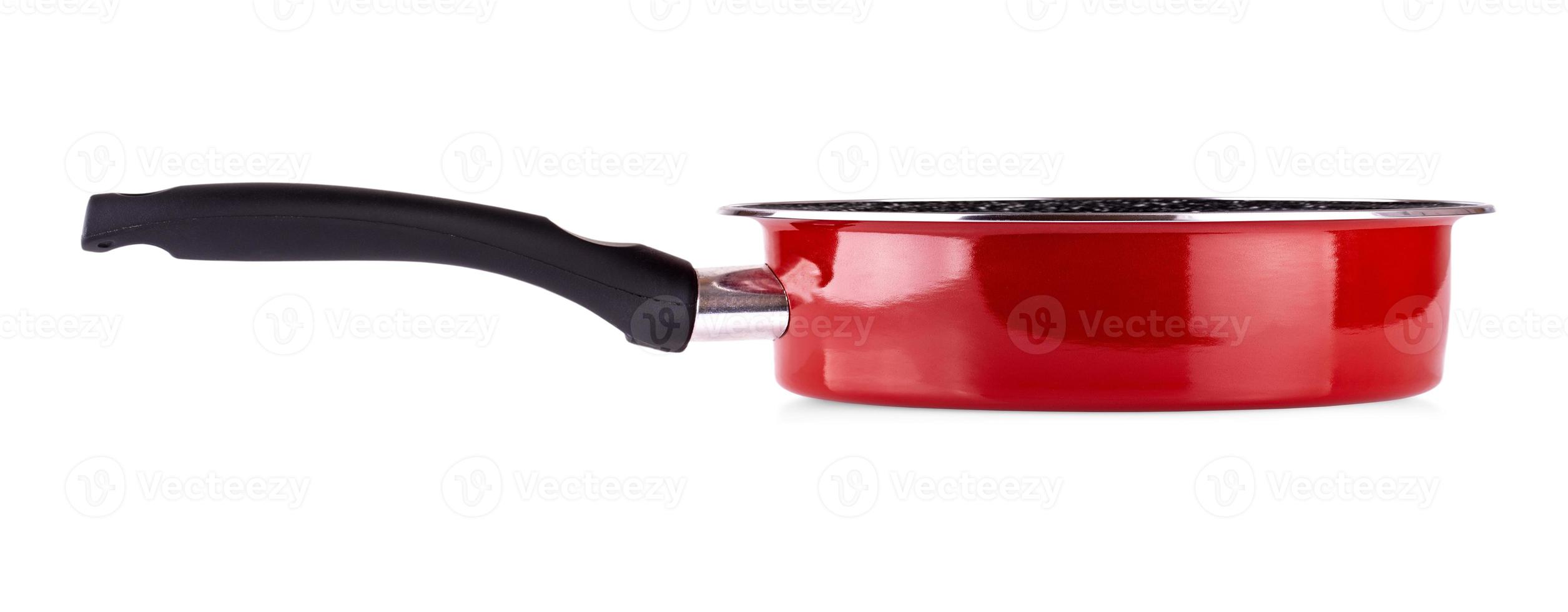 The modern red clean frying pan isolated on white photo