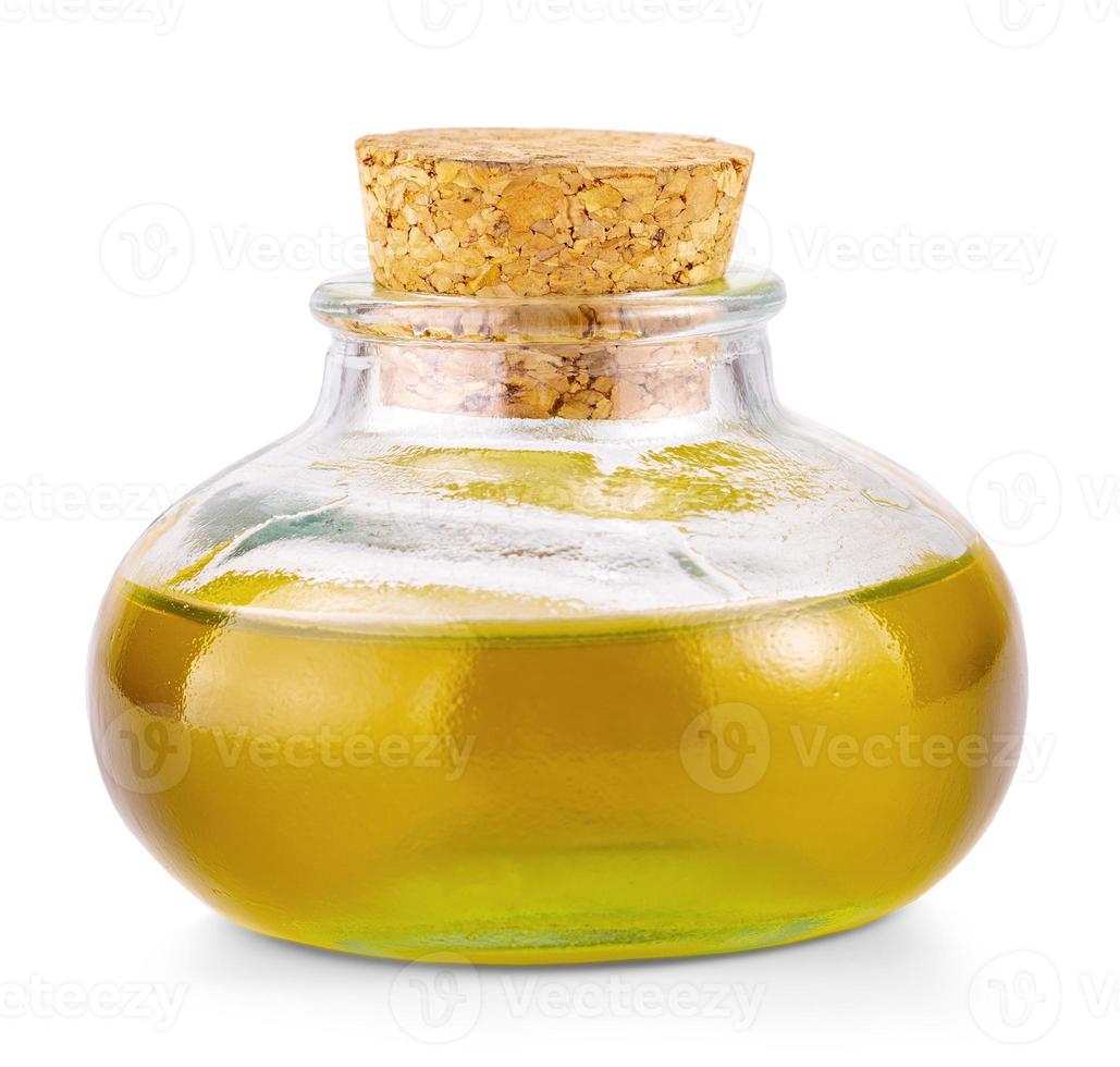 The Small oil glass bottle with a cork isolated on a white background photo