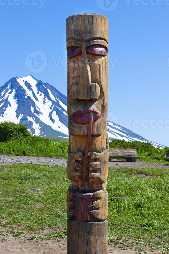 Kamchatka Aboriginal totem pole on volcano photo