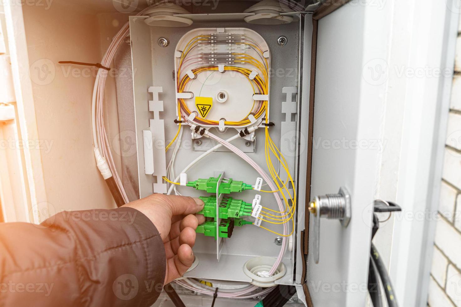 Fiber optical network cables patch panel and switch. photo