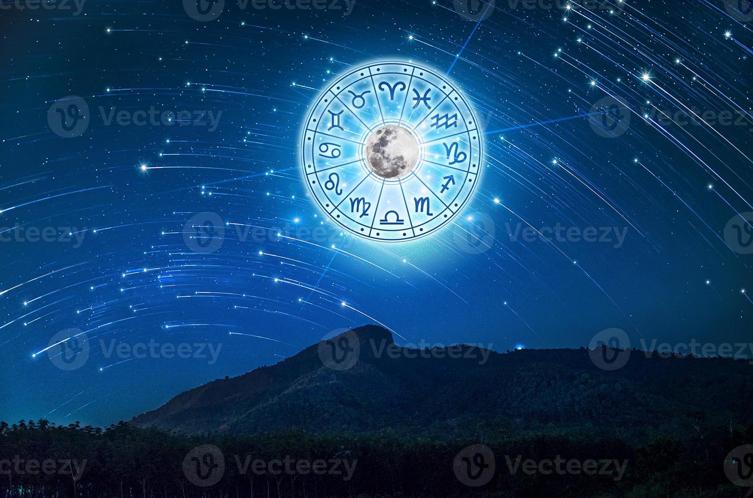 Zodiac signs inside of horoscope circle. Astrology in the sky with many stars and moons  astrology and horoscopes concept photo