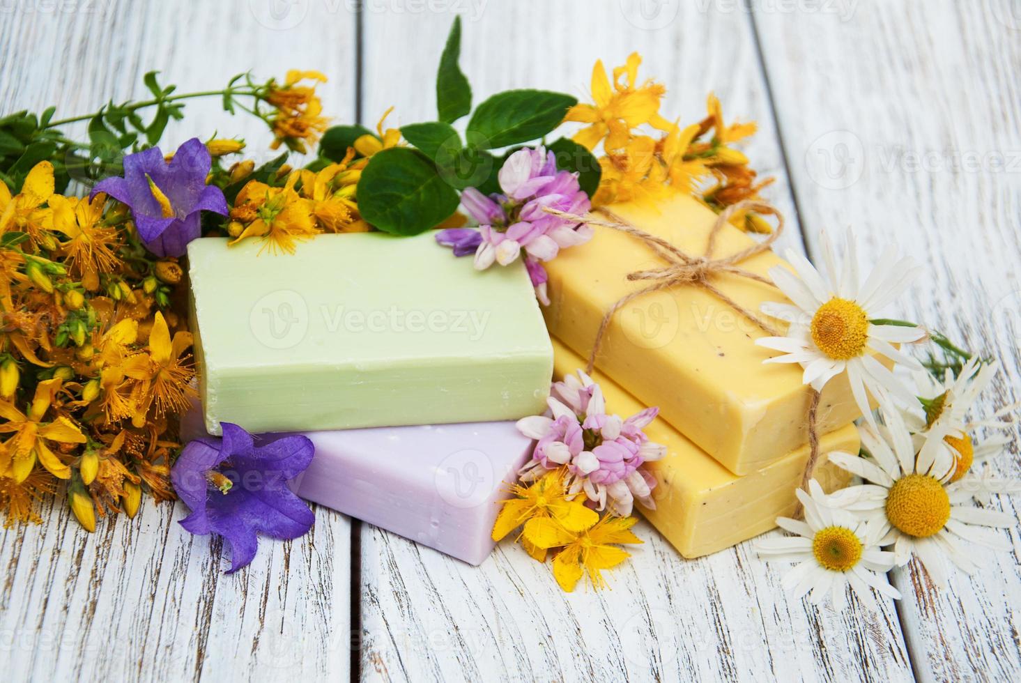 herbal  treatment - camomile, tutsan and soap photo