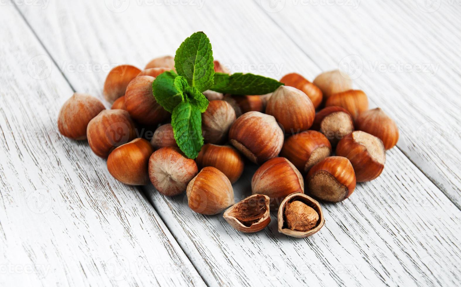 hazelnuts on a wooden table photo