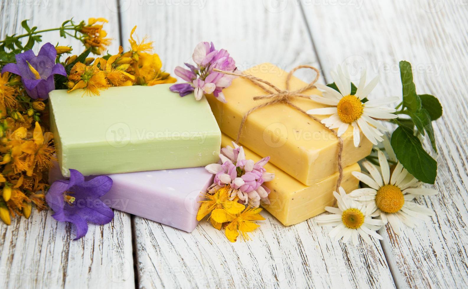herbal  treatment - camomile, tutsan and soap photo