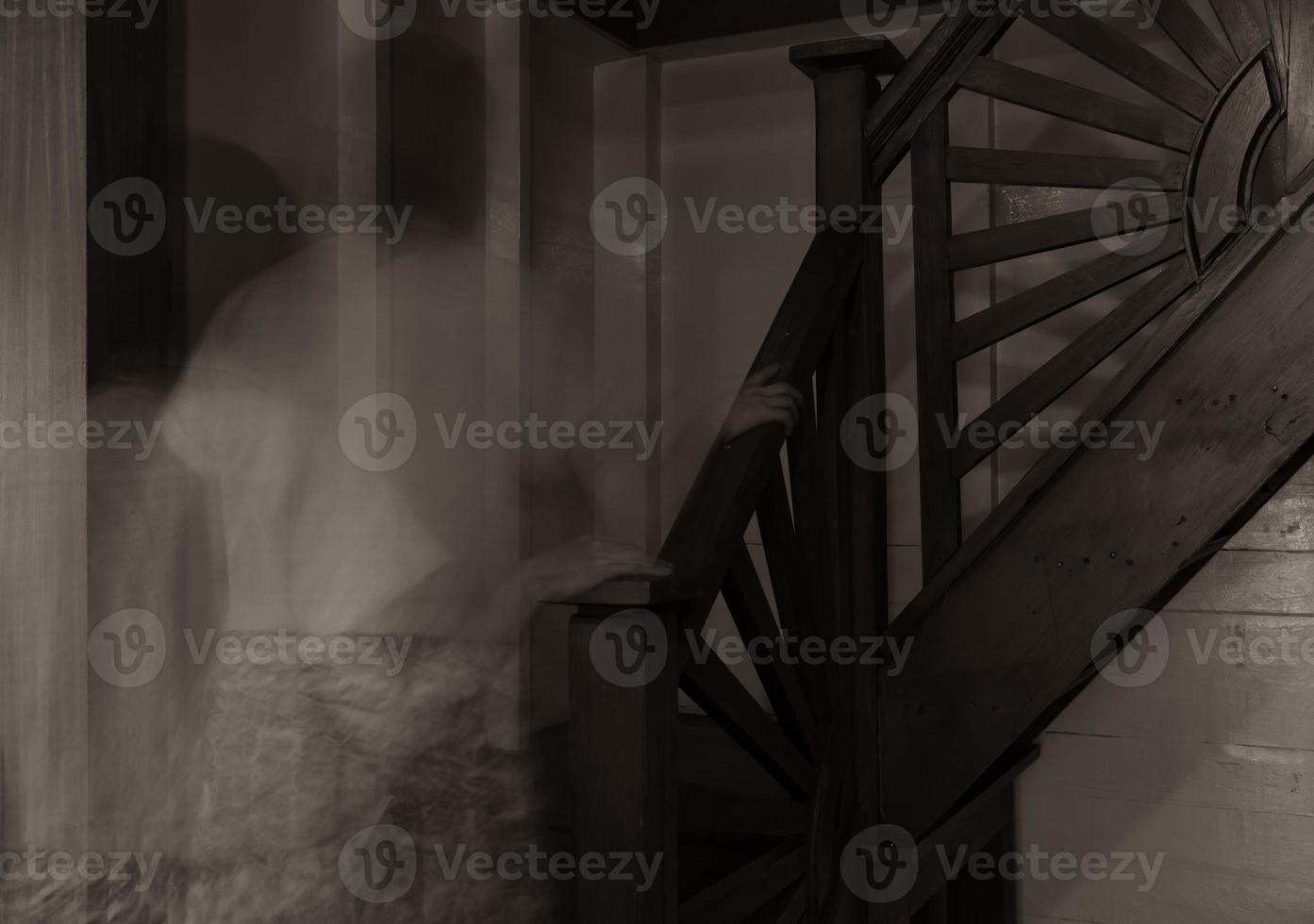 Ghost Walking up Stairs in Old Vintage House. Long Exposure Technique photo