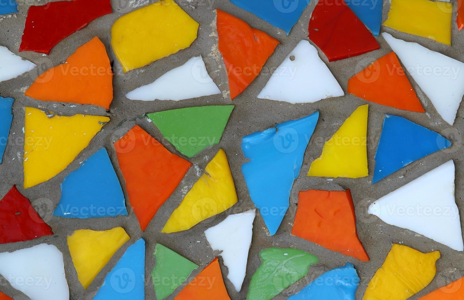 Mosaic pattern close up in retro style. Colorful polygons background. photo