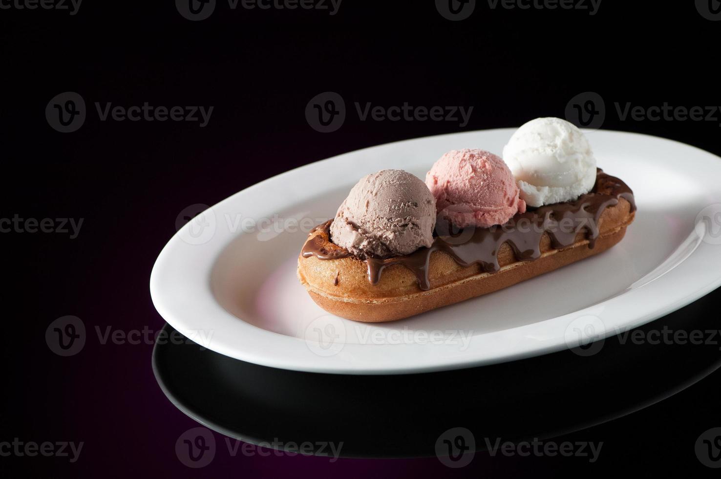 Waffles and ice cream in a dish photo