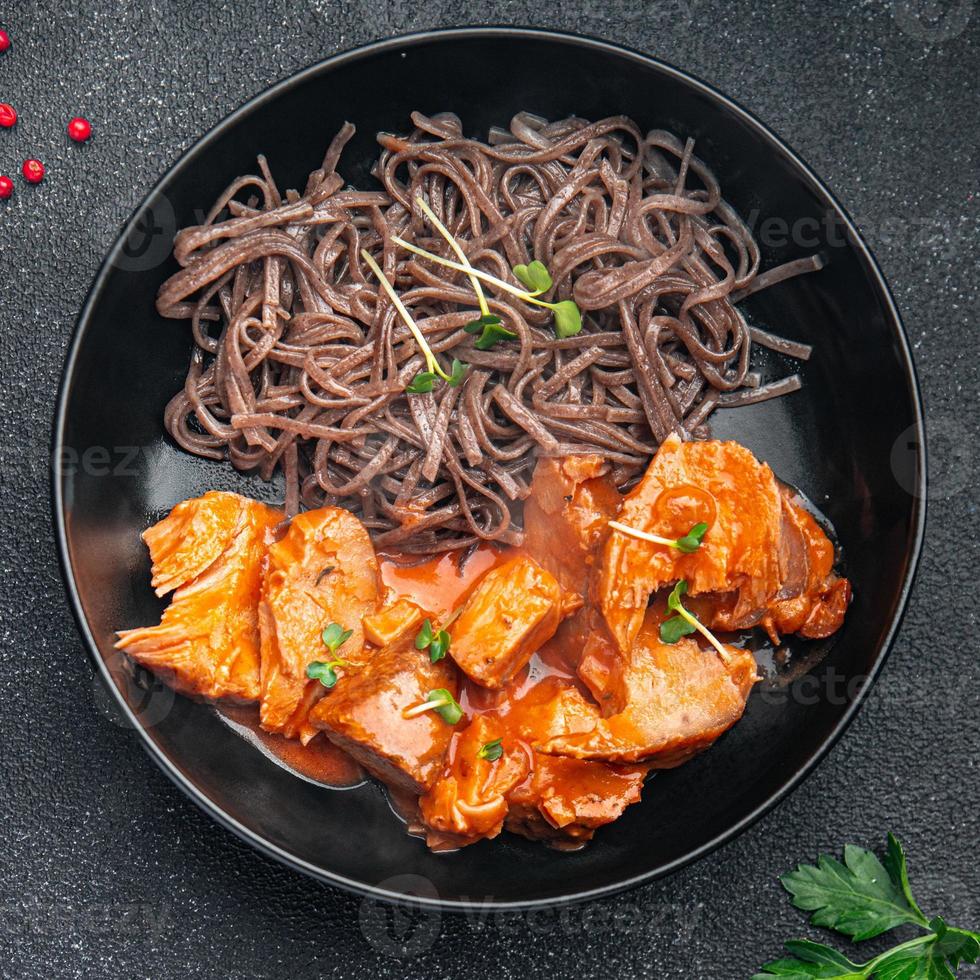 wok noodles soba buckwheat meal tomato sauce meat food photo