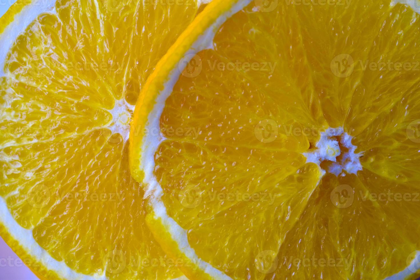 Orange slices sliced on a plate close-up photo