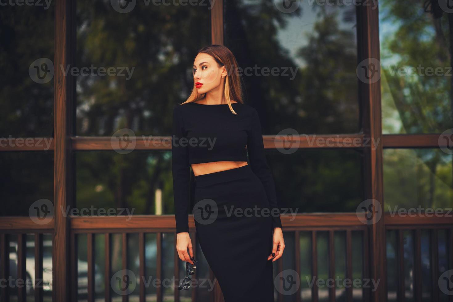 Fashionable young woman in skirt photo