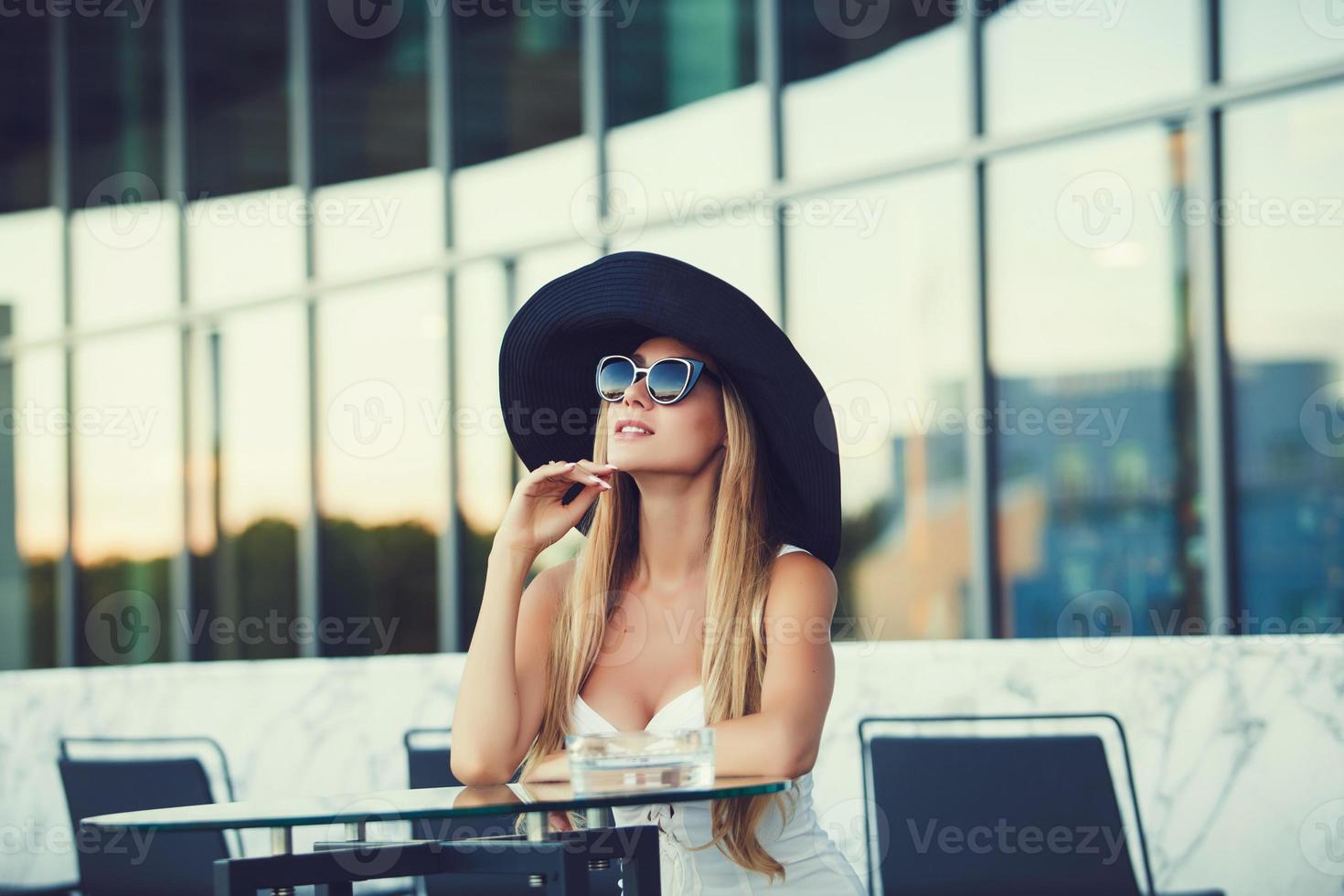 Young pretty sexy girl in hat photo