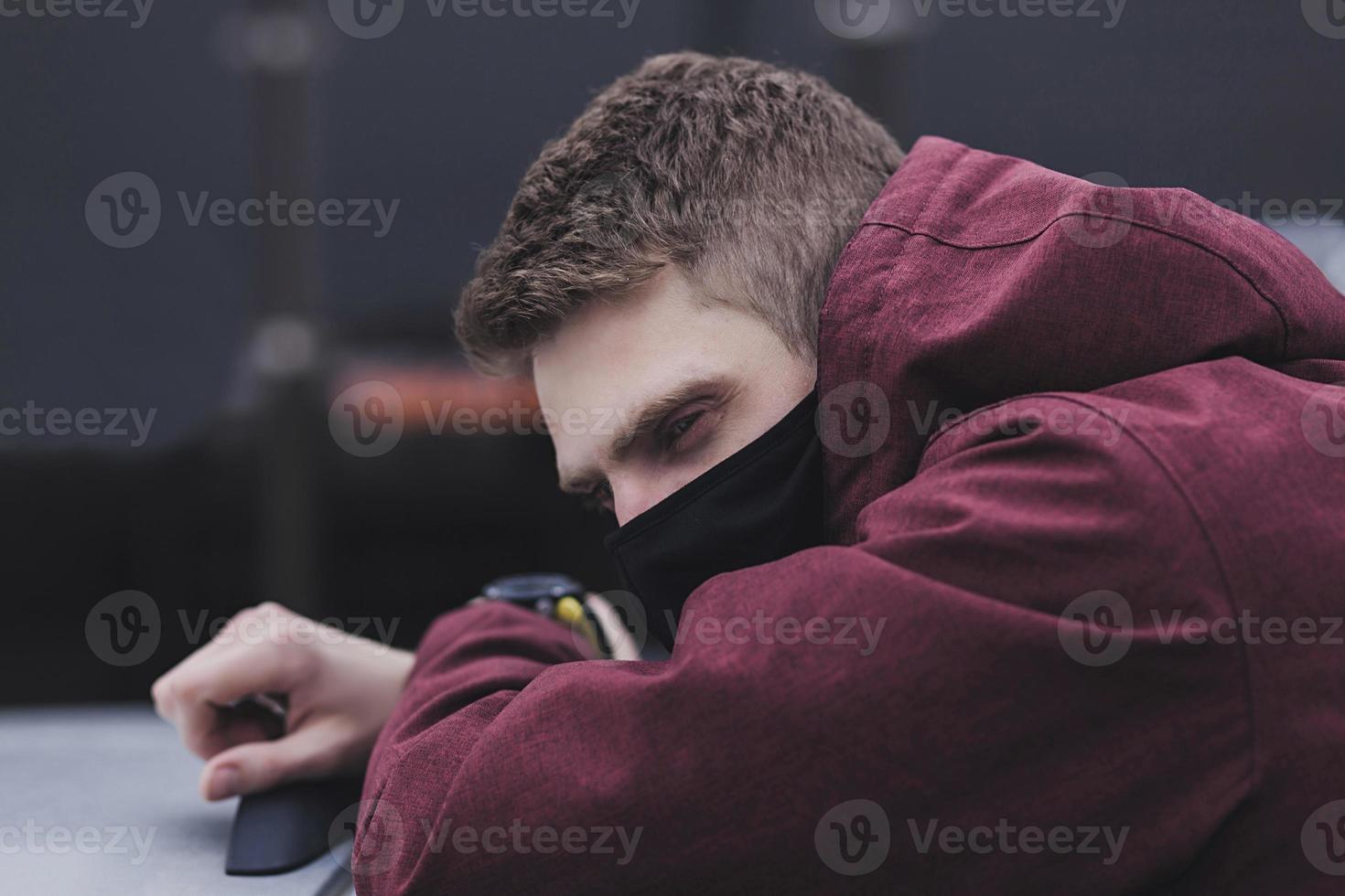 man in a black mask photo