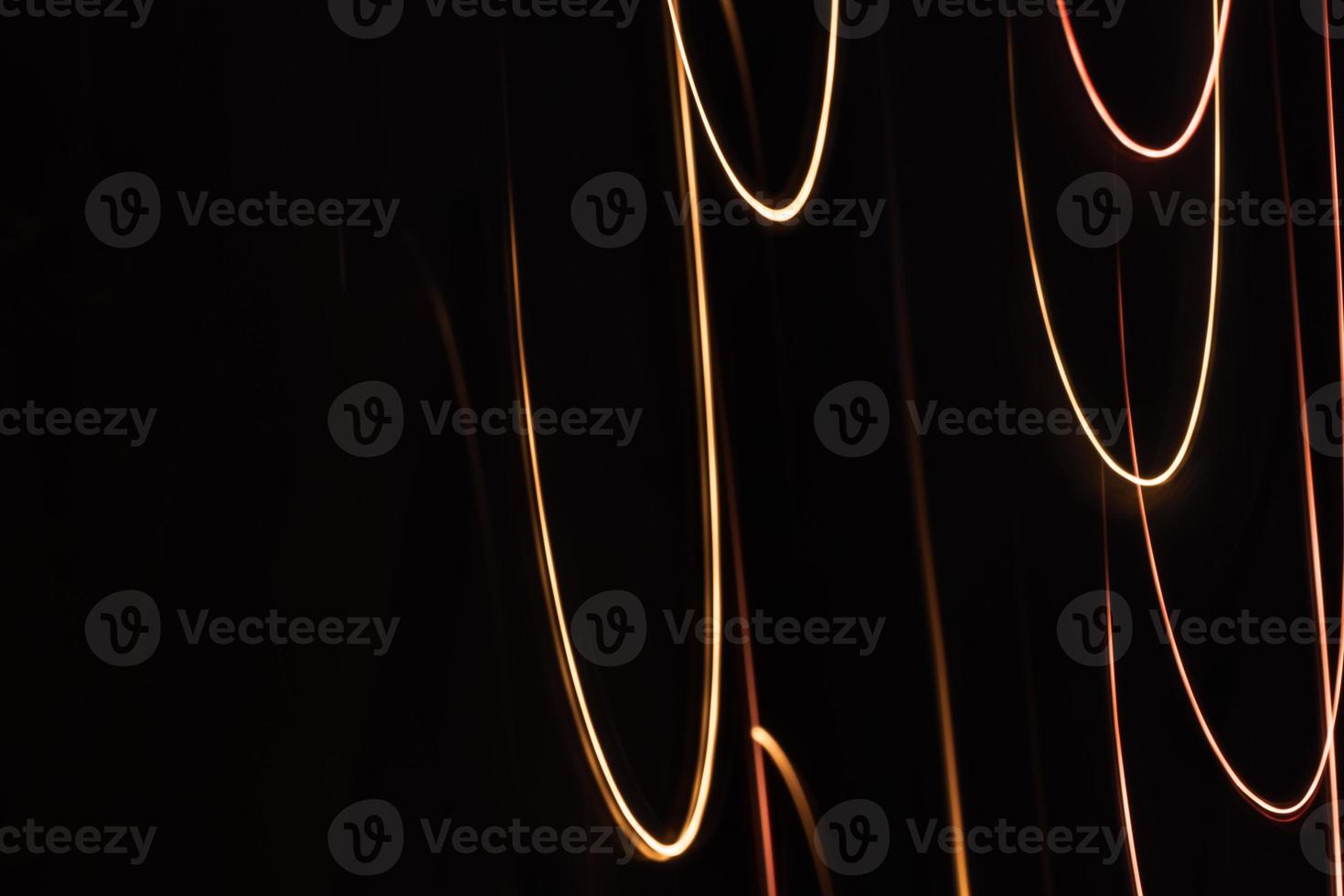 Abstract bright multi colored loops on a dark background. Digital back banner. Technology and science theme. photo
