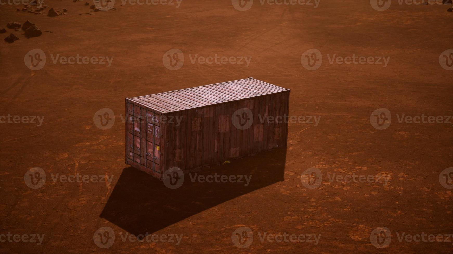 abandoned shipping container in the desert photo