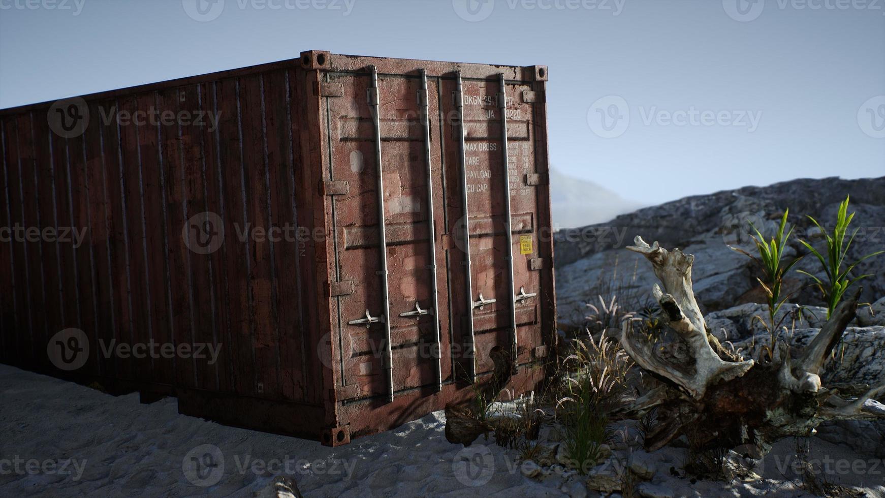 abandoned shipping container in the desert photo