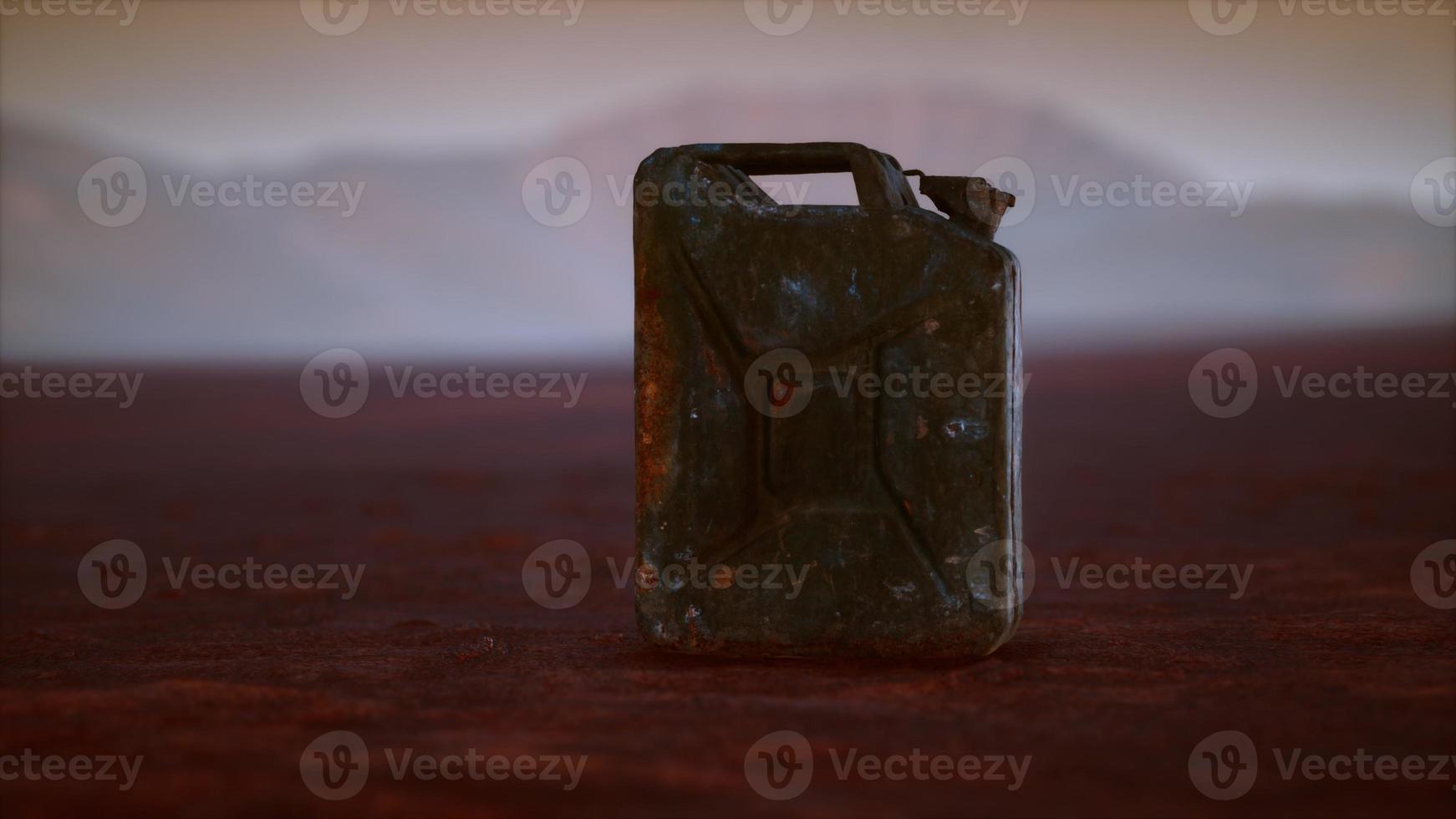 old rusty fuel canister in the desert photo