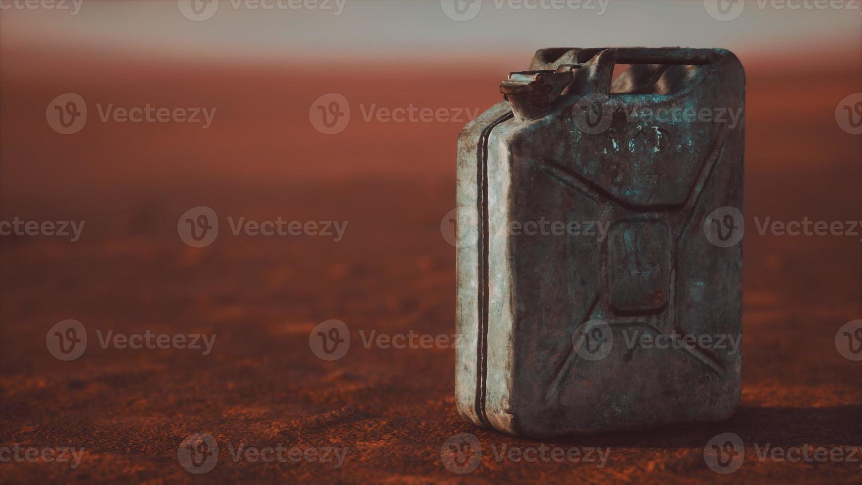 old rusty fuel canister in the desert photo