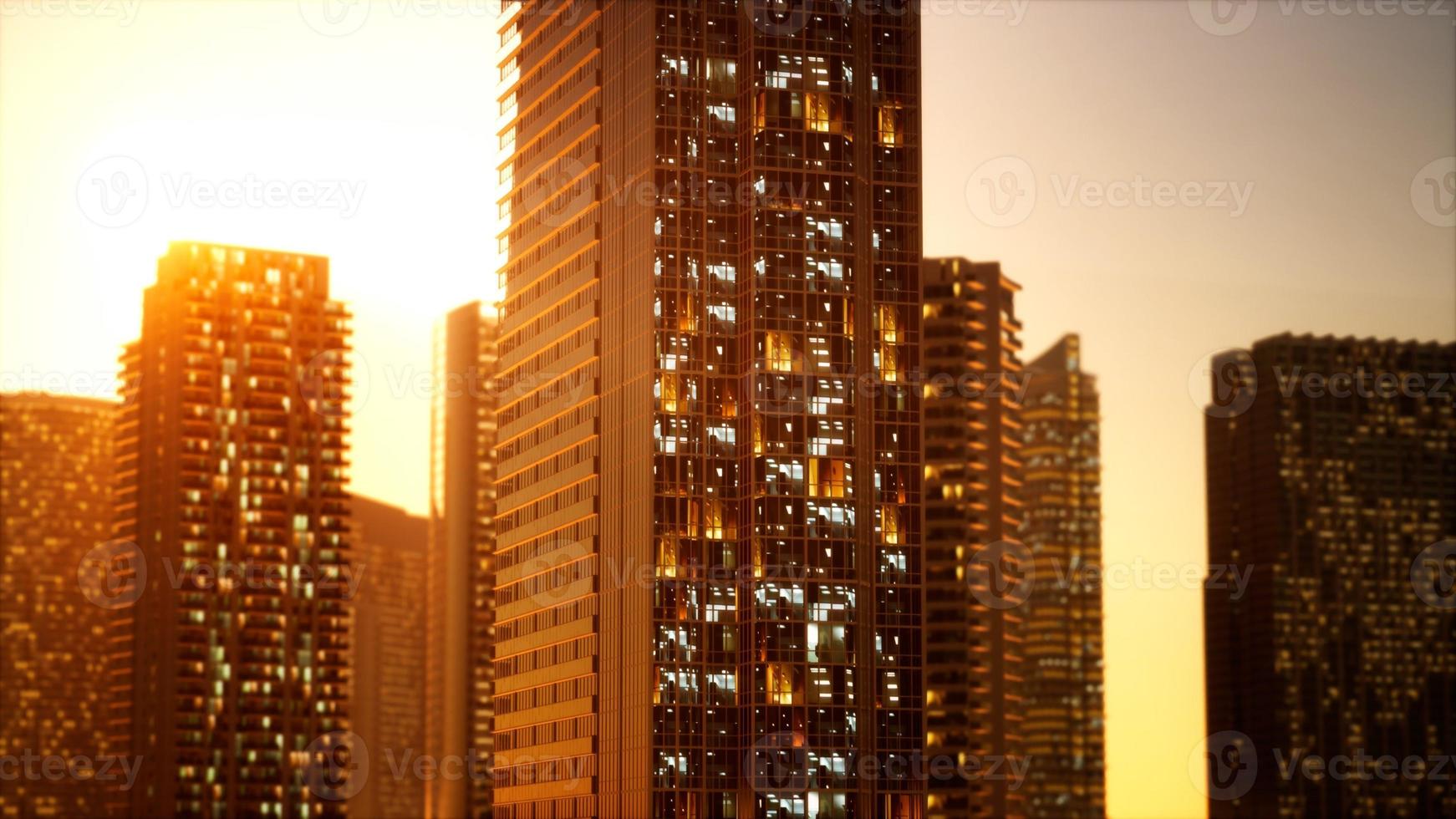 toma aérea al atardecer de los rascacielos del centro de negocios foto