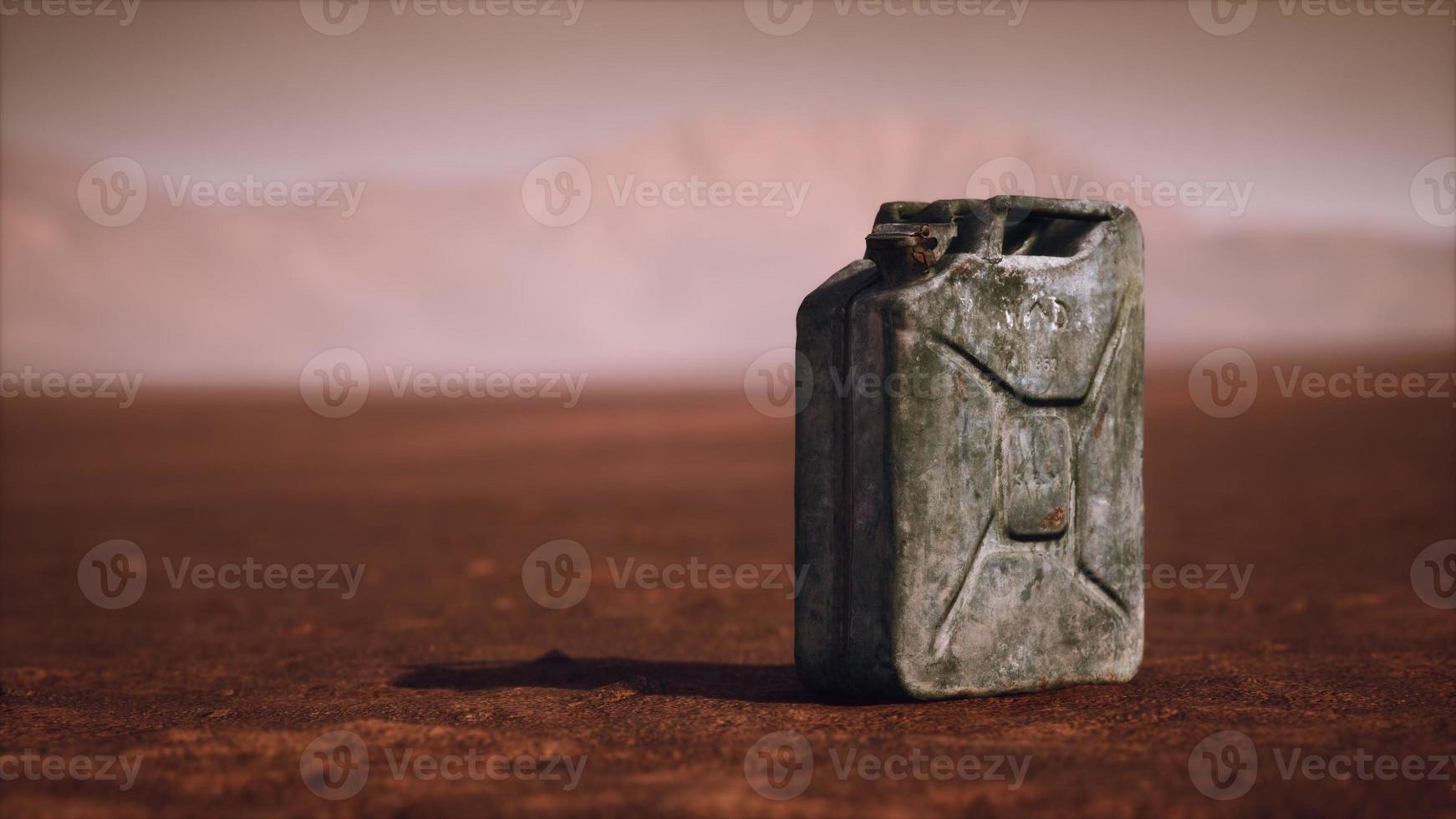 old rusty fuel canister in the desert photo
