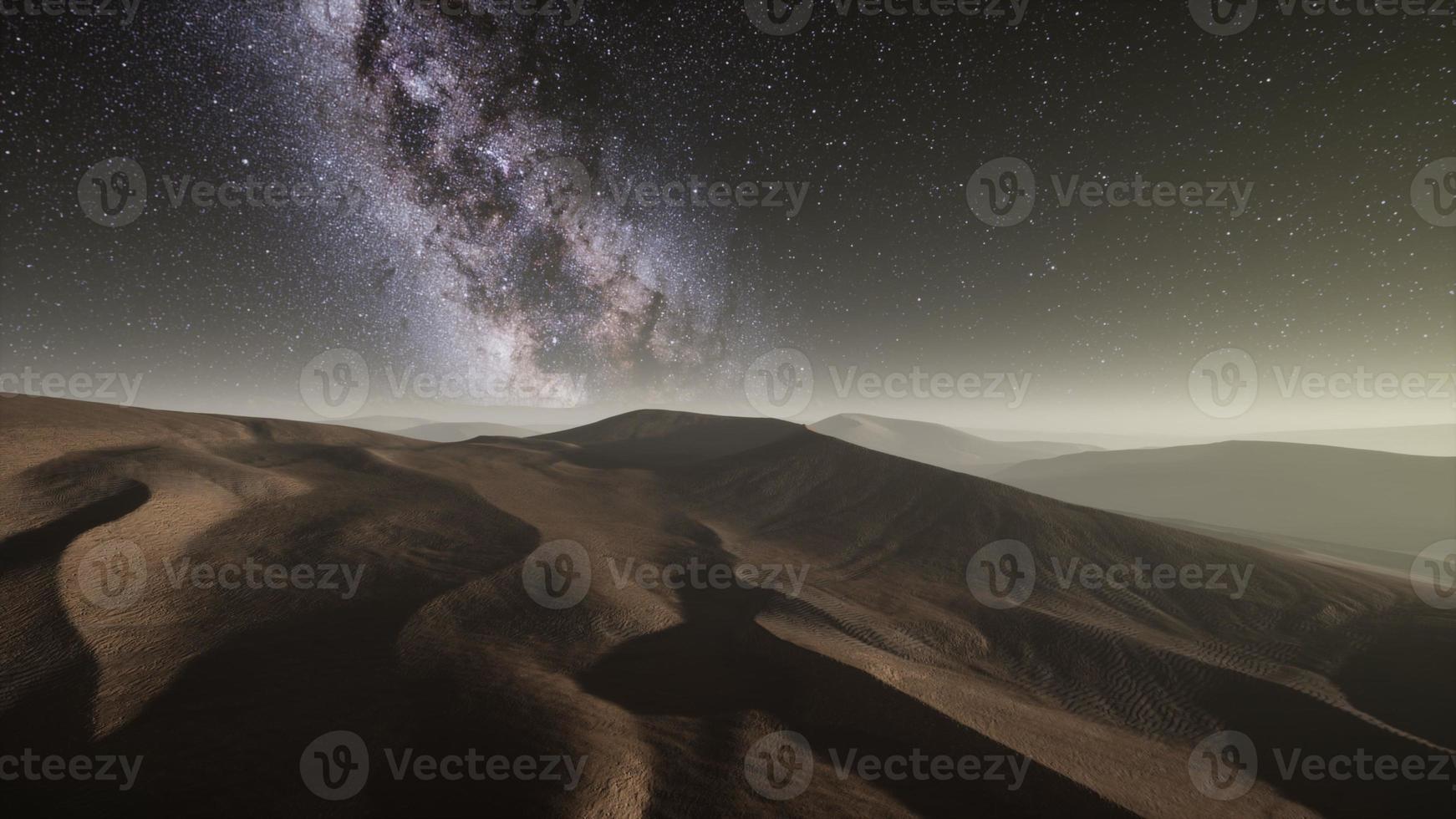 Amazing milky way over the dunes Erg Chebbi in the Sahara desert photo