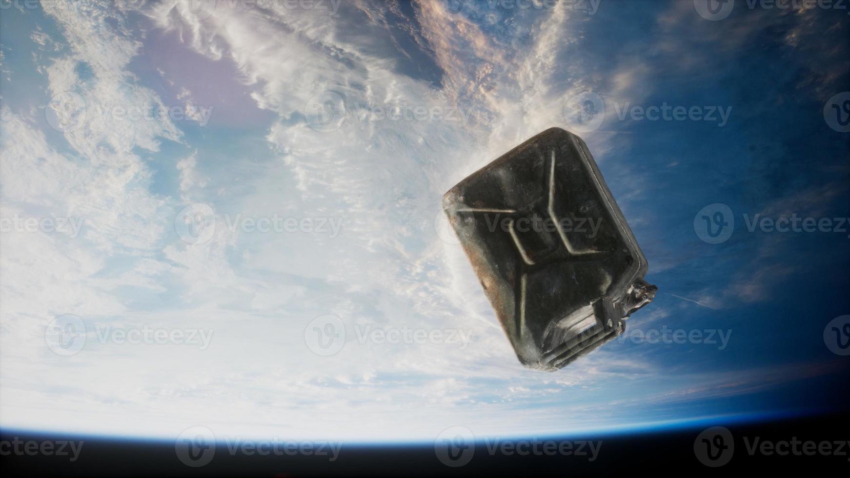 metal vintage and dirty jerrycan on Earth orbit photo
