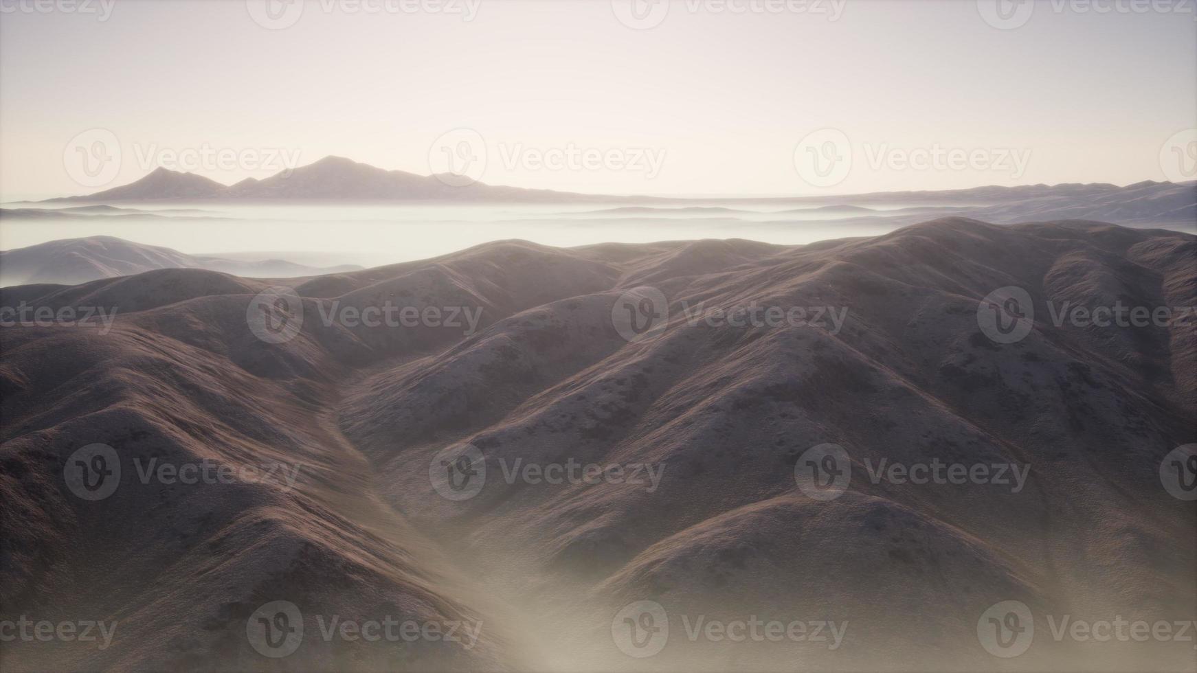 mountain landscape with deep fog at morning photo