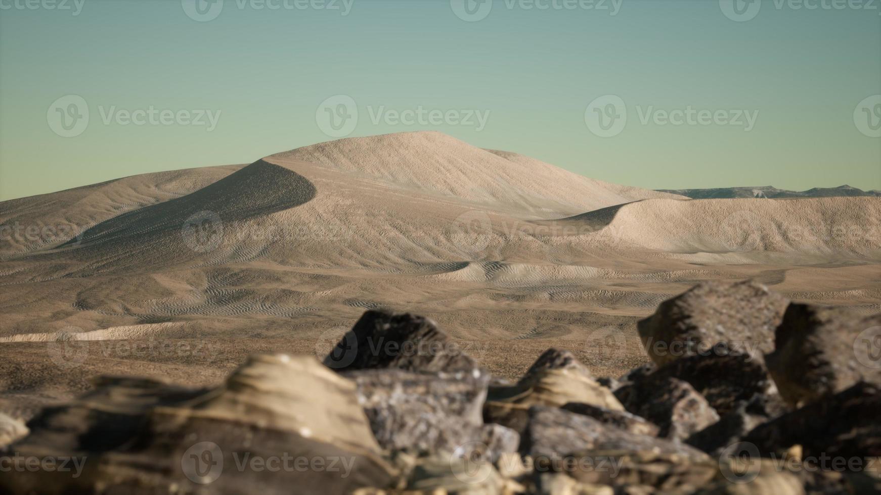 Aerial view on big sand dunes in Sahara desert at sunrise photo