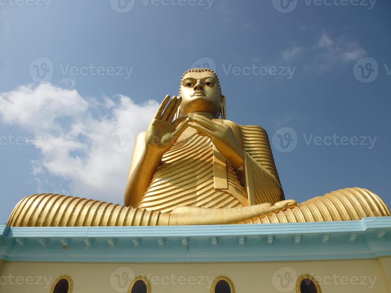 Giant Golden Buddha in Dambulla, Sri Lanka photo