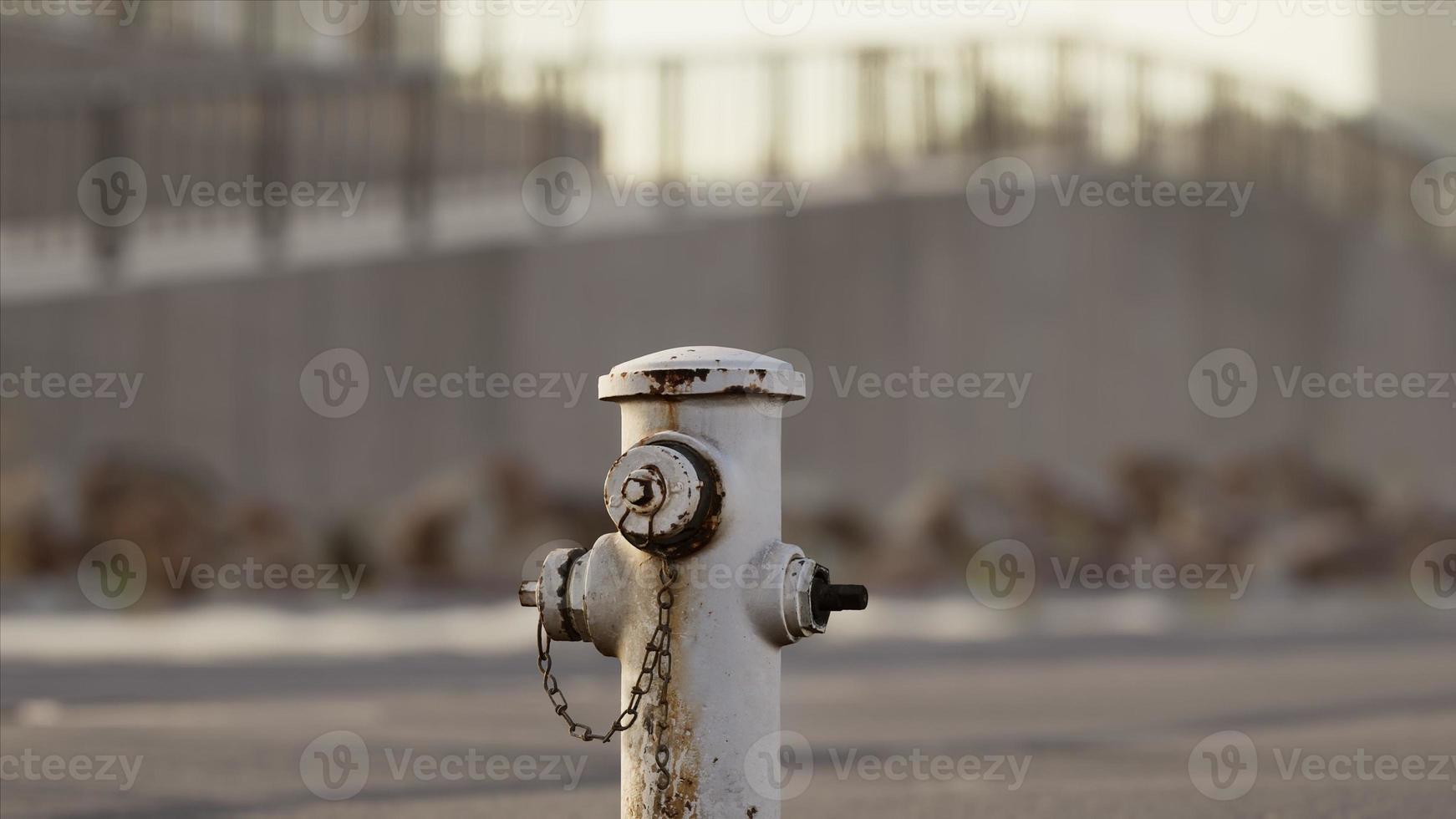 Rusty Fire Hydrant at sunny day photo