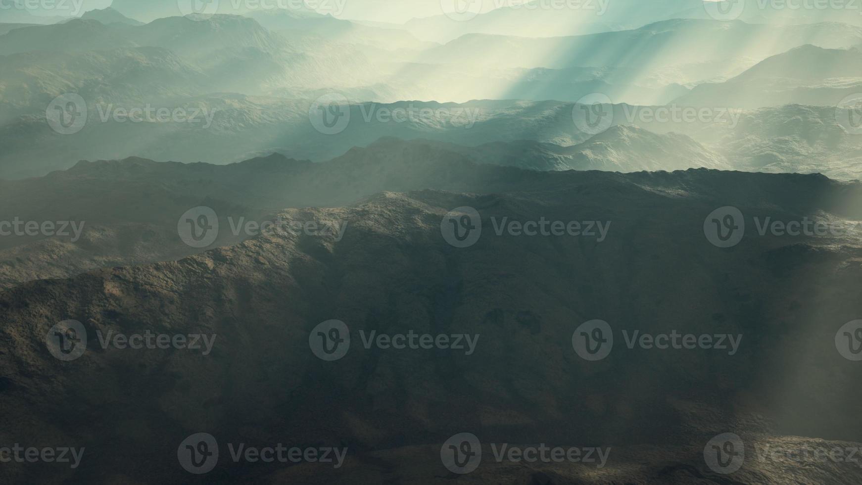 aerial vulcanic desert landscape with rays of light photo