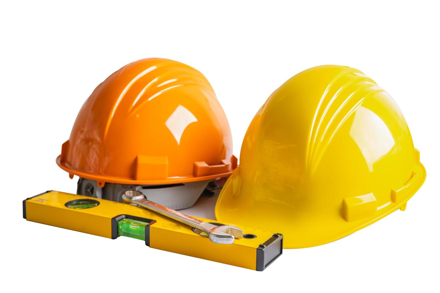 Safety first hard helmet hat and engineer tool with copy space, engineering construction and architecture concept. photo