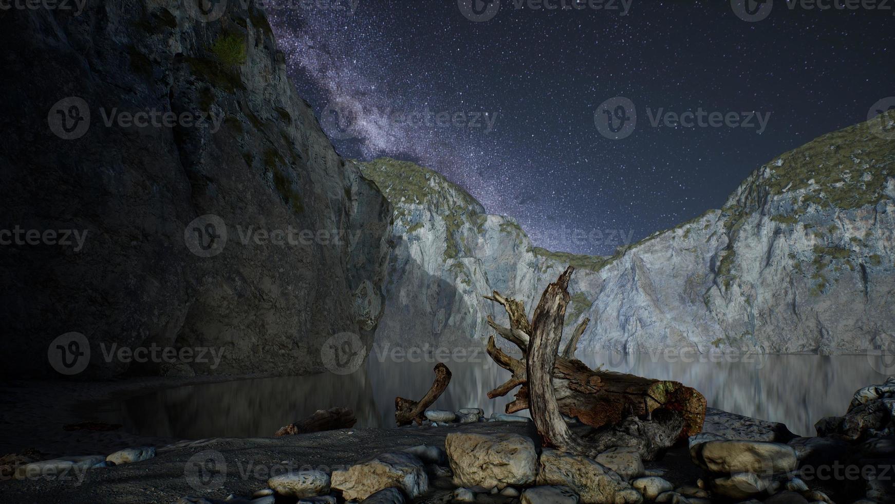 hyperlapse of night starry sky with mountain and ocean beach in Lofoten Norway photo
