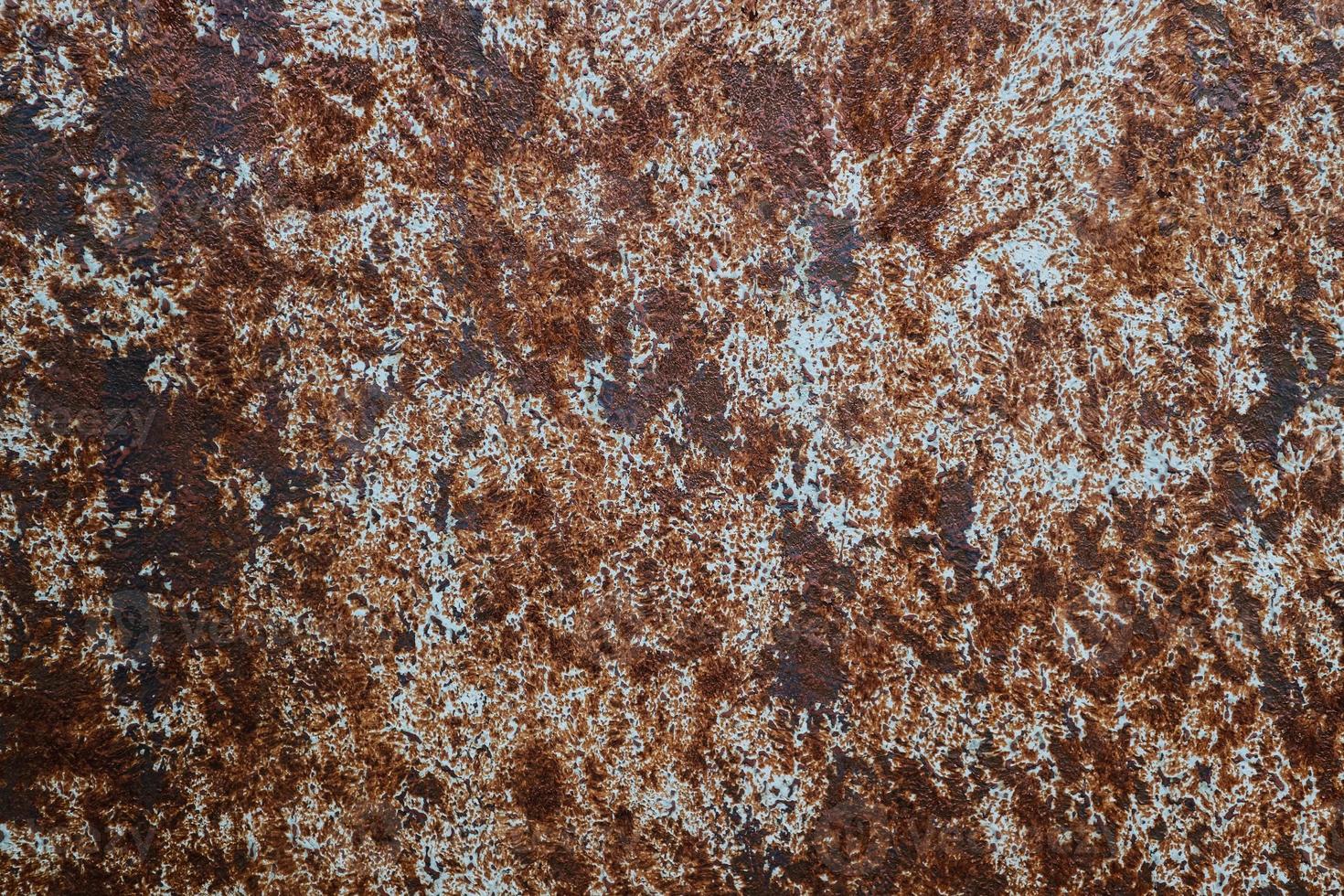 Old grunge rusty metal texture with scratches and crack. Vintage dark rustic metal background. photo