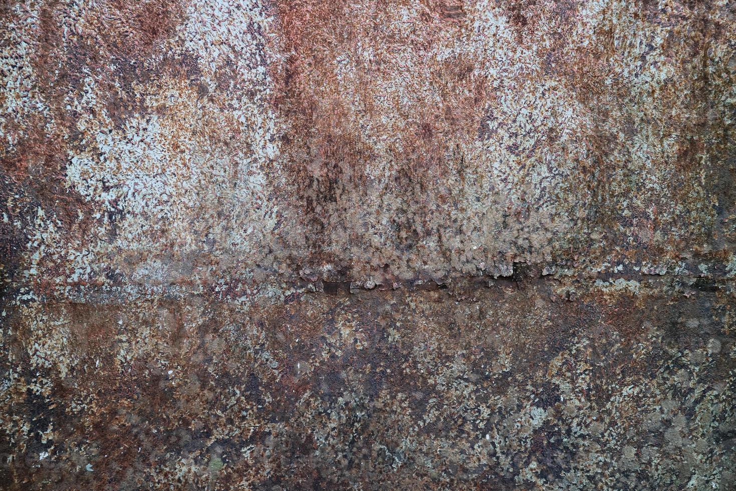 Old grunge rusty metal texture with scratches and crack. Vintage dark rustic metal background. photo