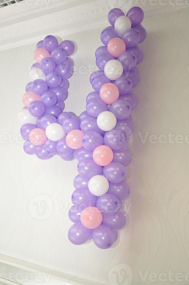 Number four balloons of birthday decoration photo