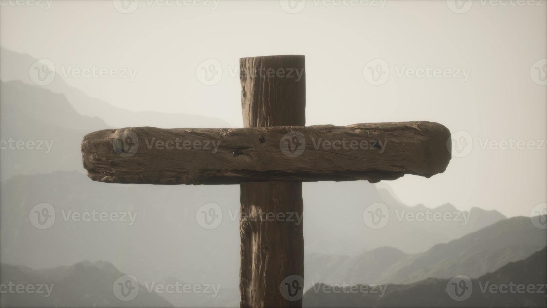 wooden Crucifix cross at mountain photo