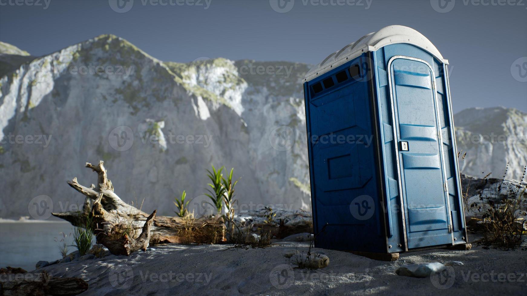 Portable mobile toilet in the beach. chemical WC cabin photo