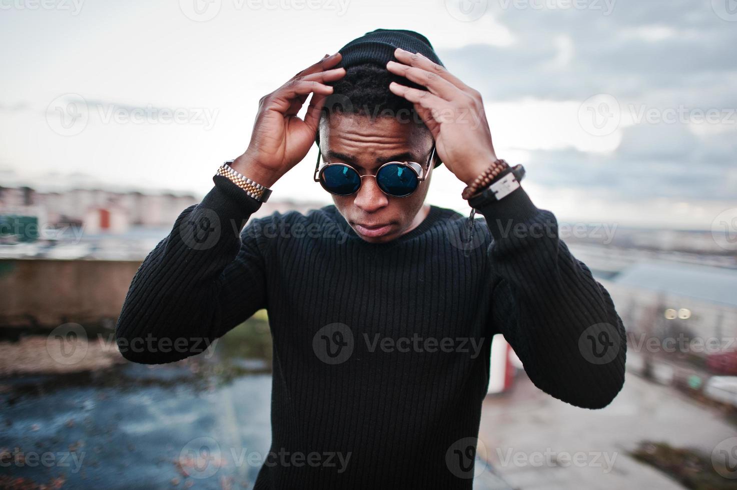 Portrait of  style black man on the roof photo