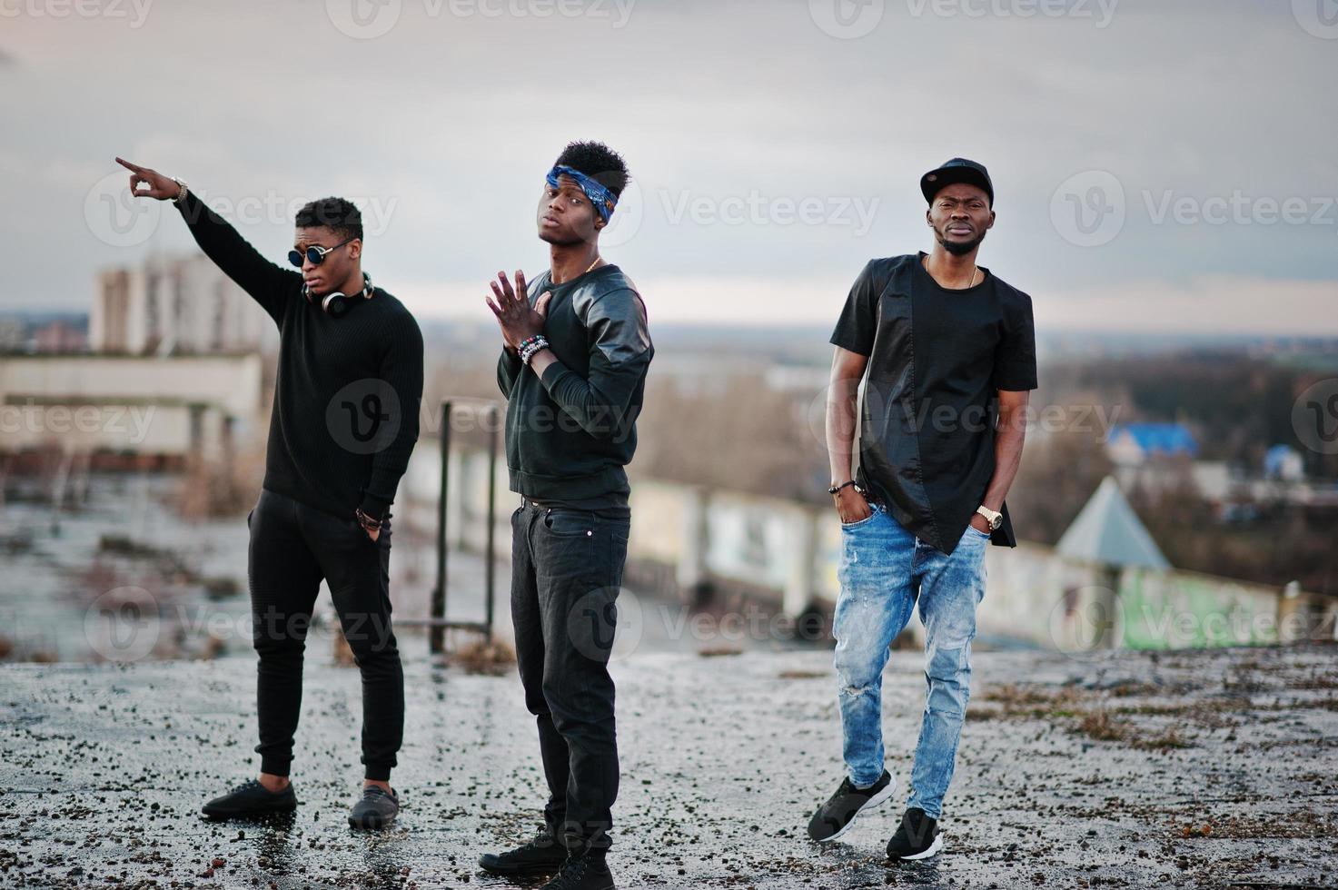 Three rap singers band on the roof photo