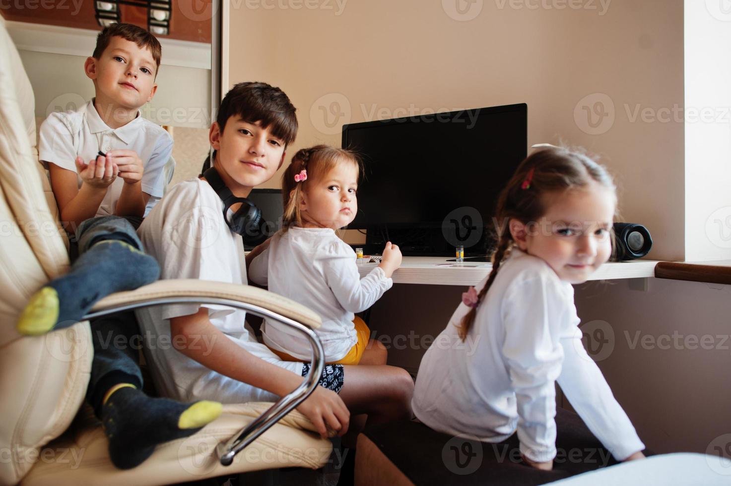 Kids using microscope learning science class at home. photo