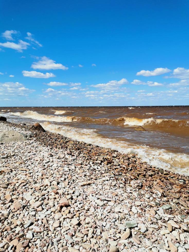 Rocky beach of lake or sea photo