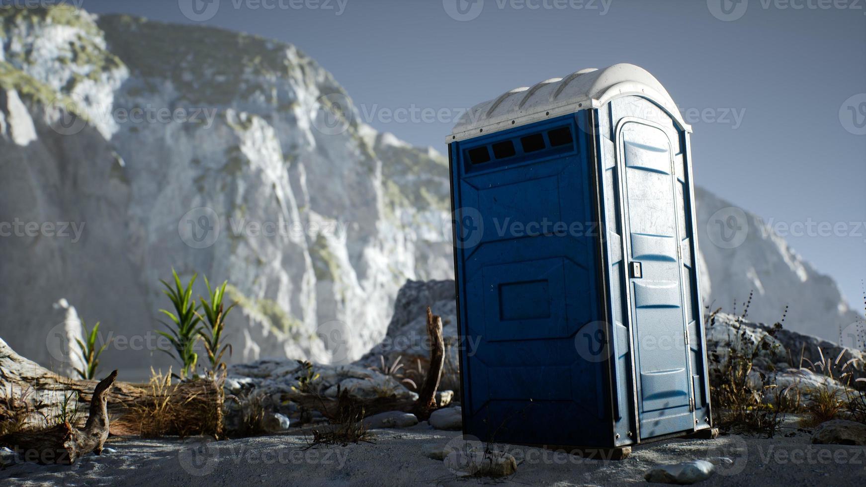 Portable mobile toilet in the beach. chemical WC cabin photo