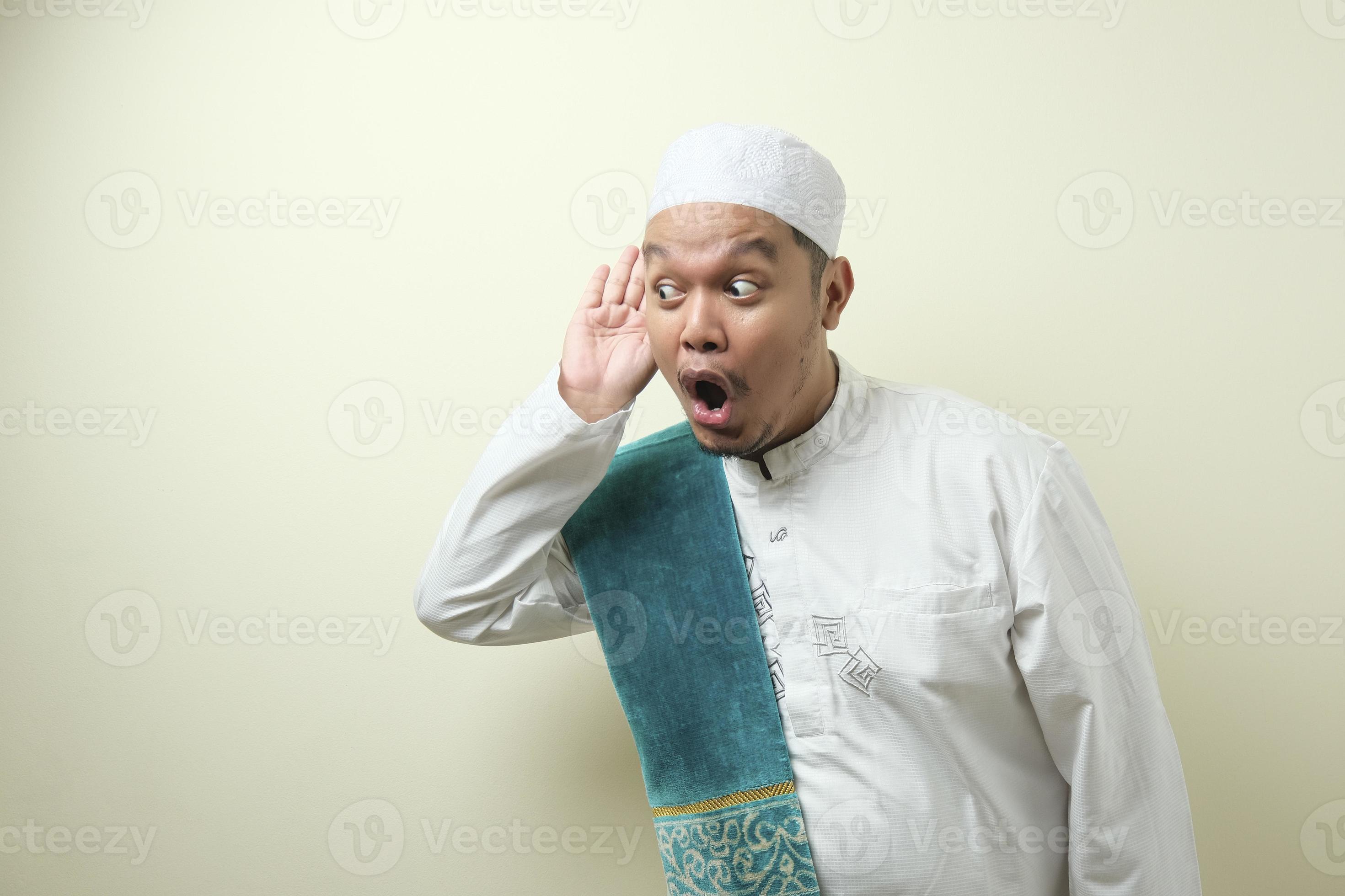 Fat asian muslim man listen whispers with funny face 5859142 Stock Photo at  Vecteezy