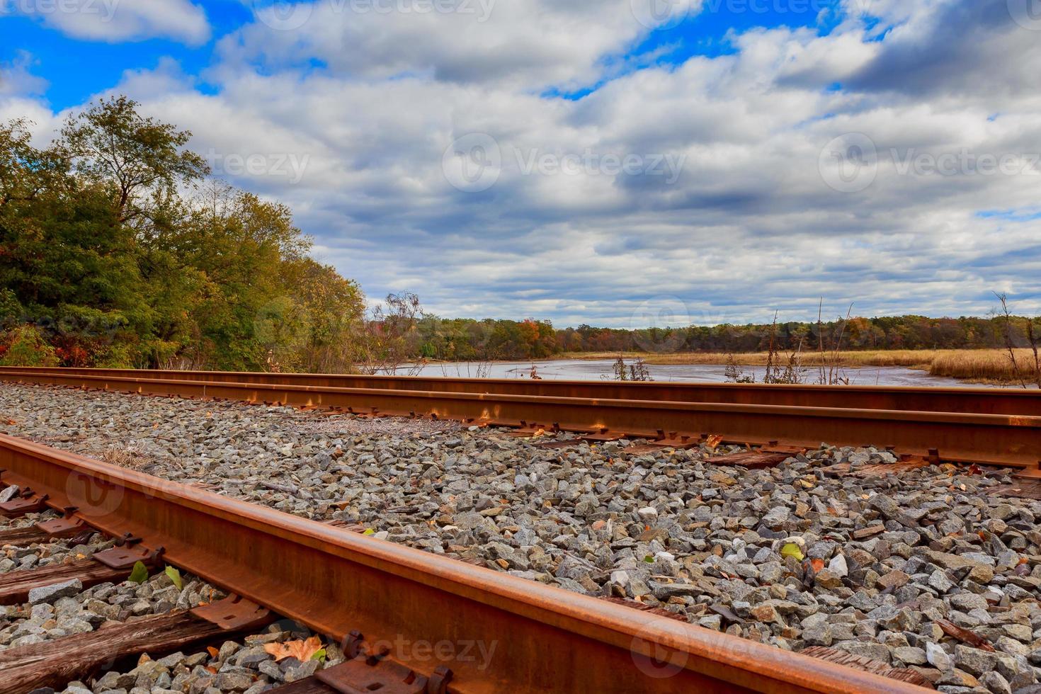 Railroad blue sky and cloudy rain photo