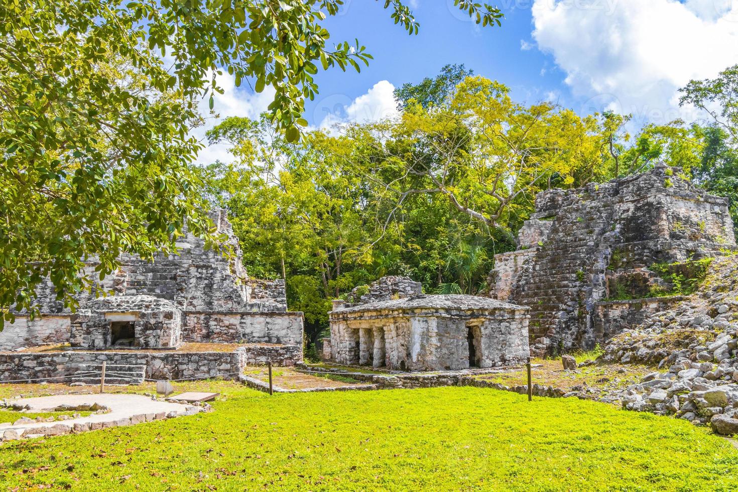 Ancient Mayan site with temple ruins pyramids artifacts Muyil Mexico. photo