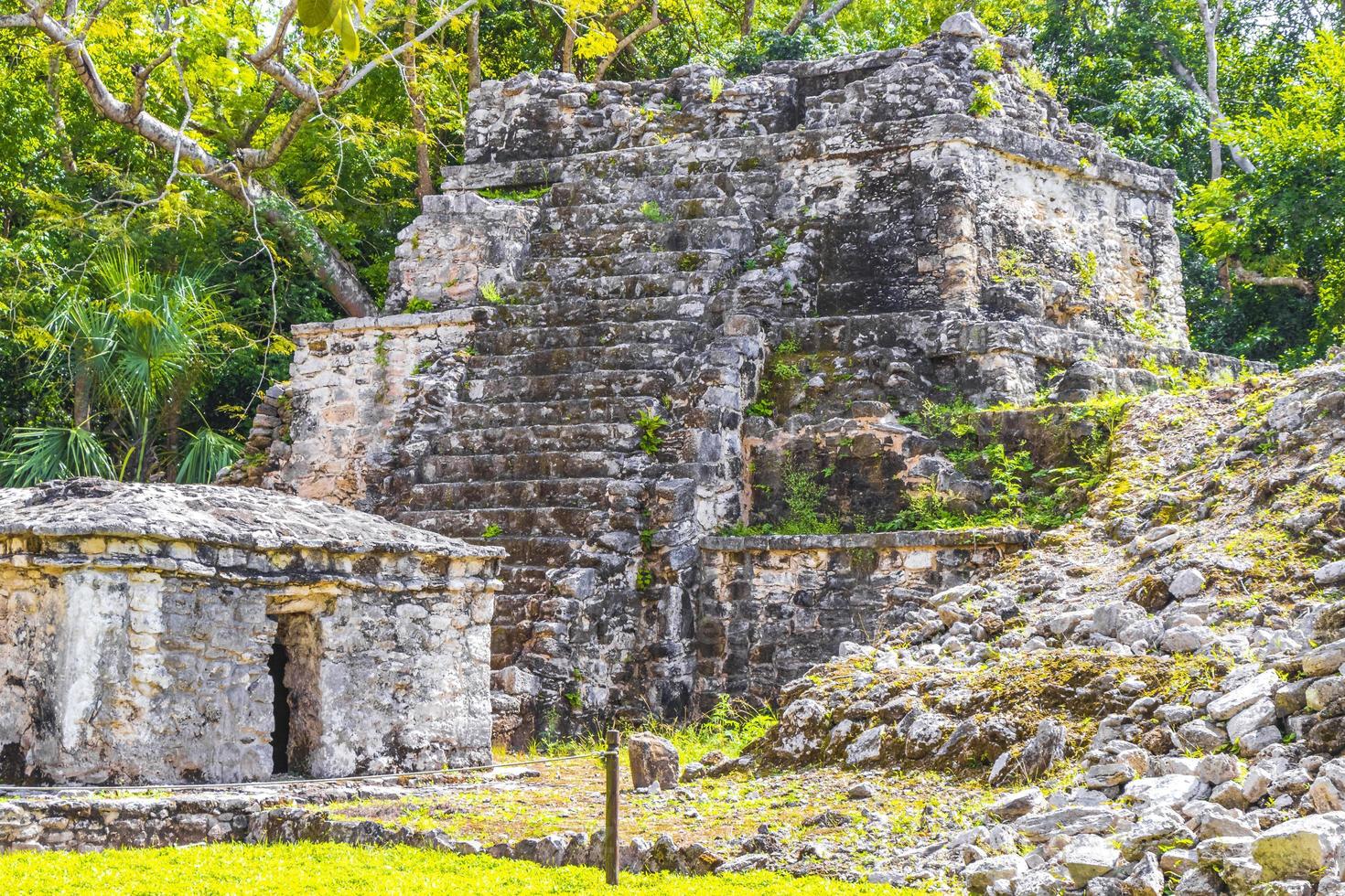 Ancient Mayan site with temple ruins pyramids artifacts Muyil Mexico. photo