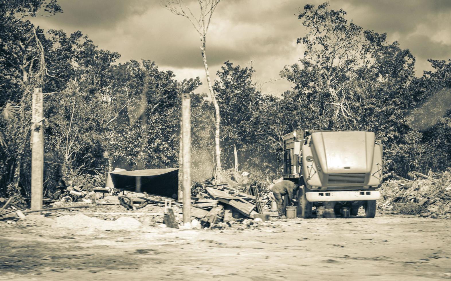 Trucks dump truck excavators and other industrial vehicles Tulum Mexico. photo