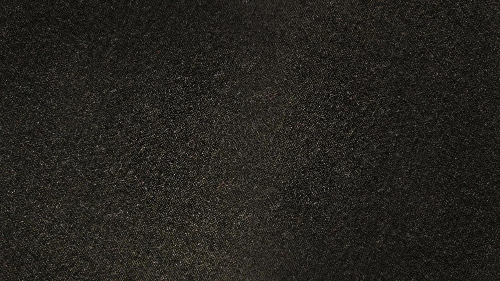 Old Black cotton fabric pattern texture background. photo