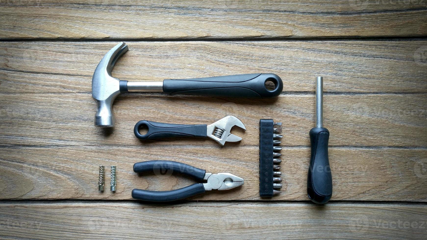 tools on wood background photo