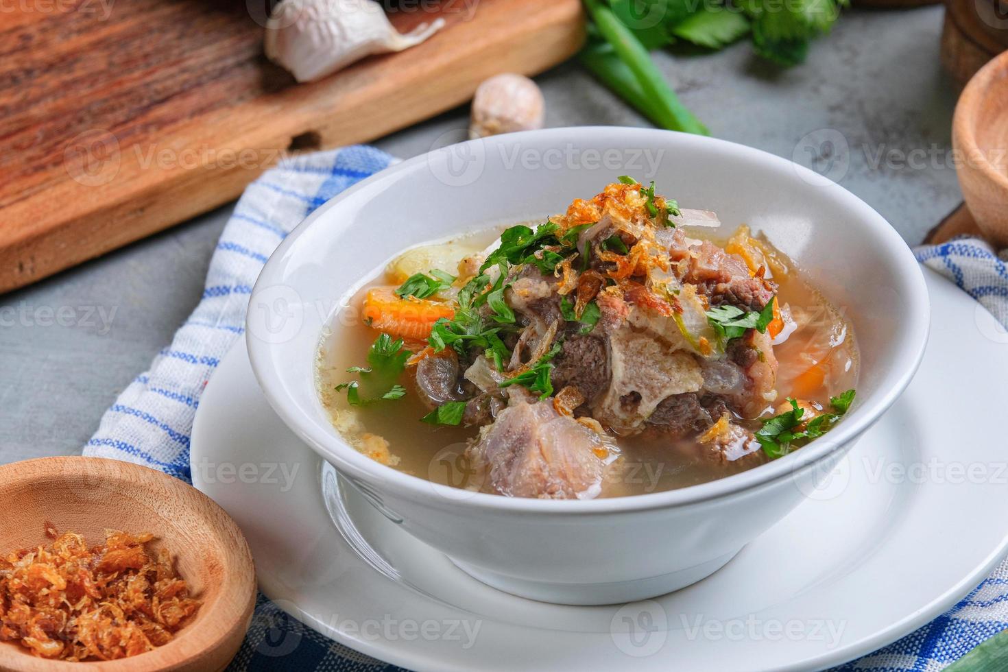 Indonesian traditional culinary, called sop buntut or oxtail soup photo